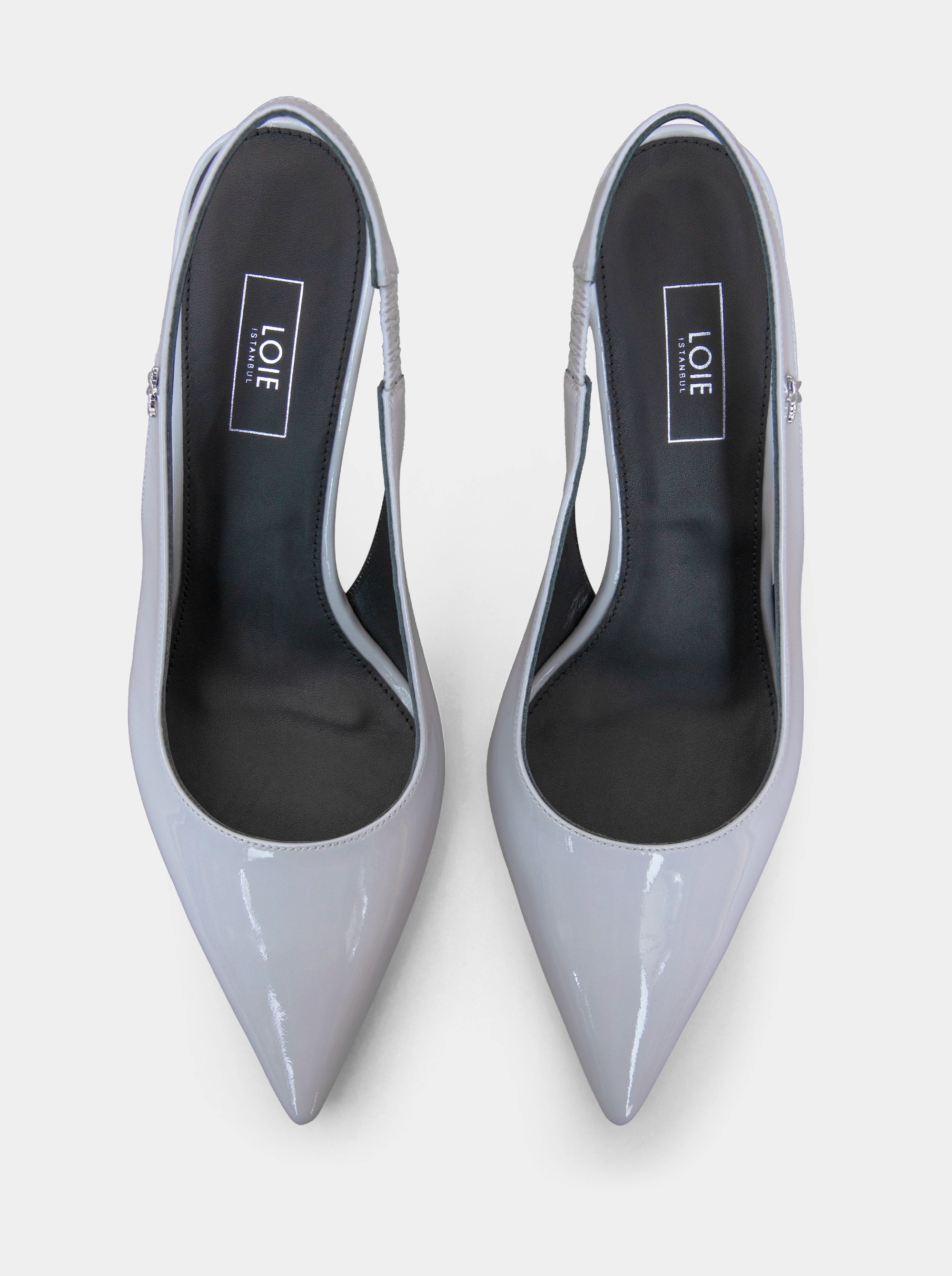 FORCE GREY PATENT PUMPS