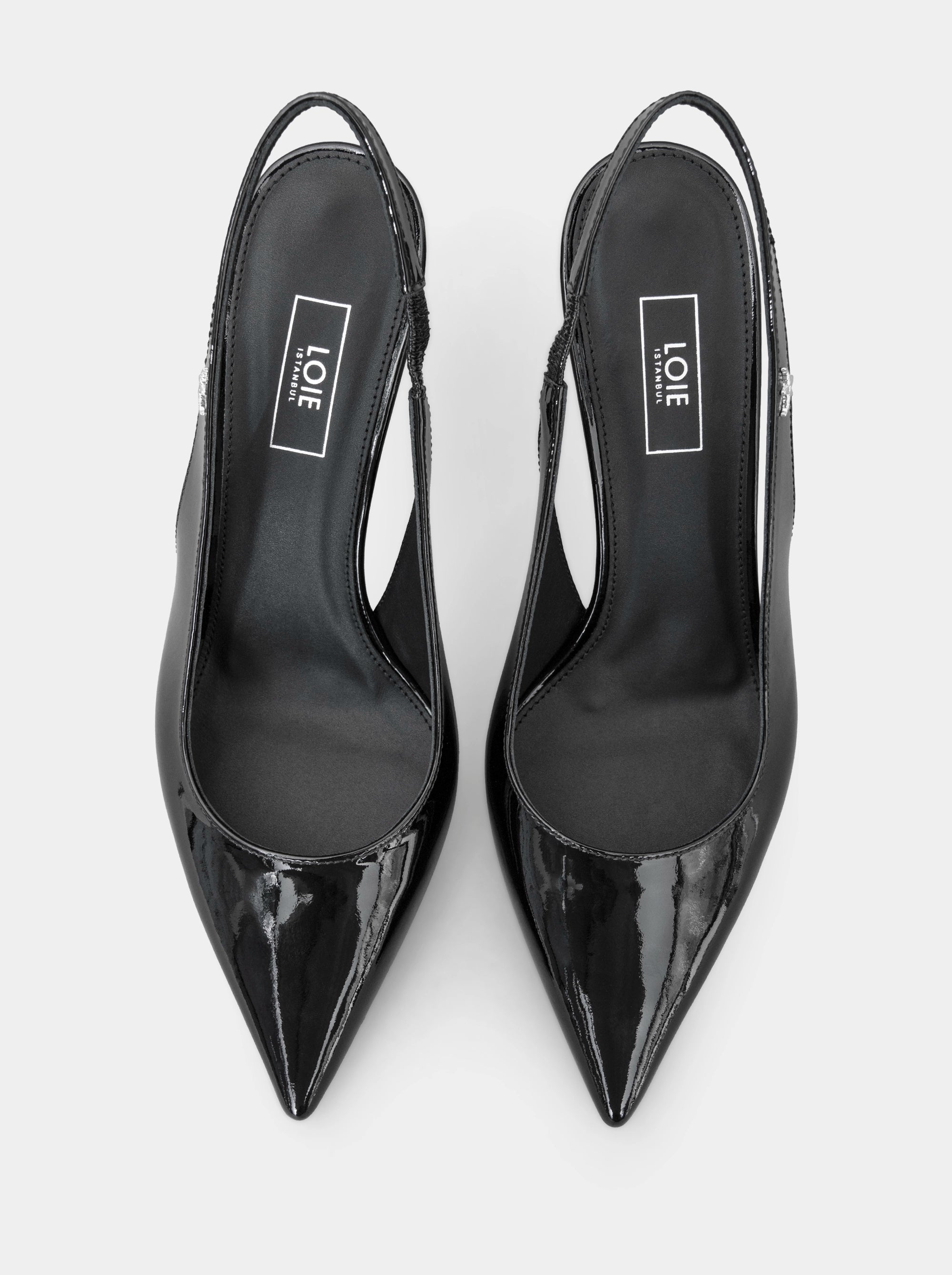 FORCE BLACK PATENT PUMPS